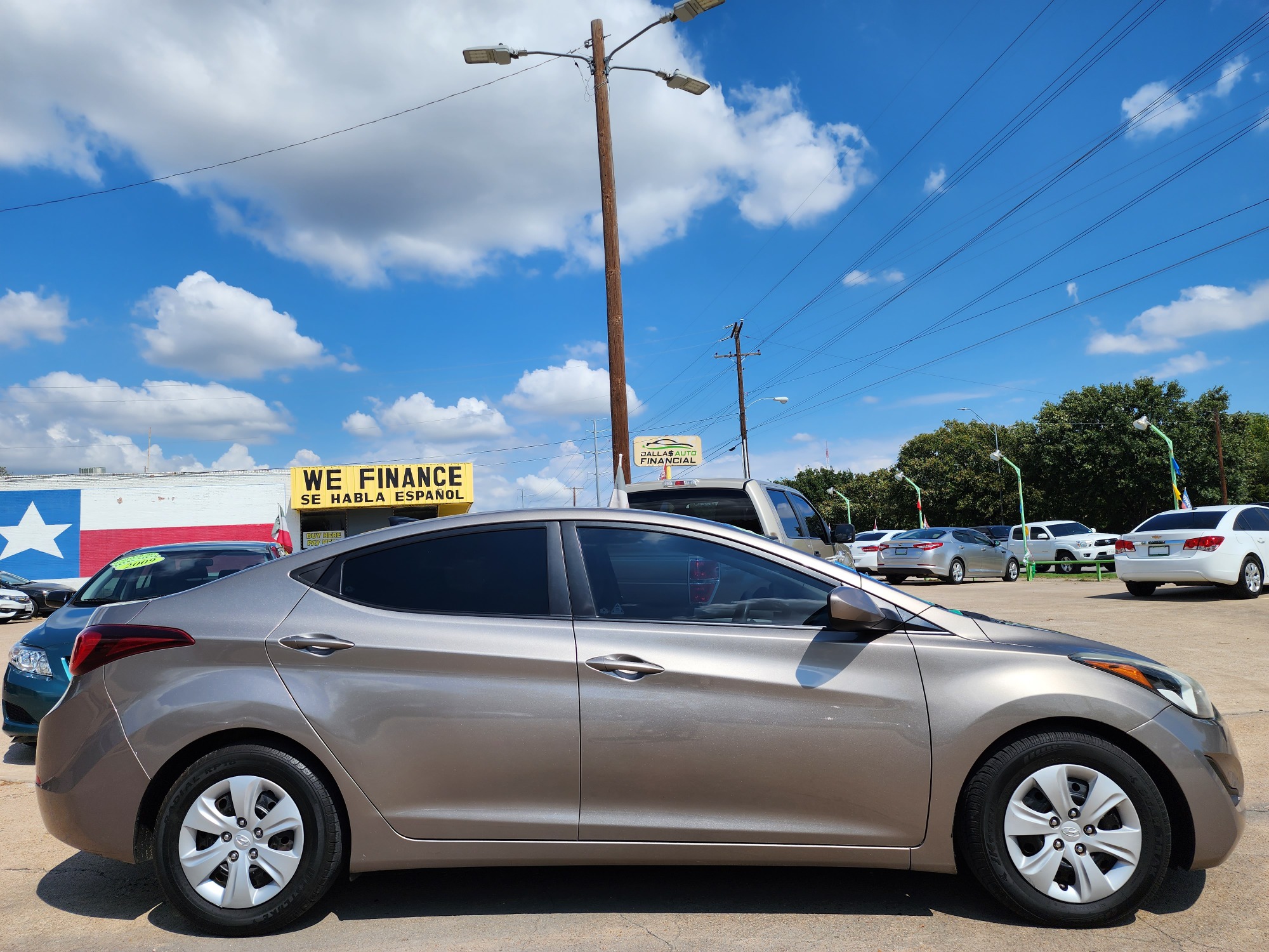 2016 BROWN Hyundai Elantra SE (5NPDH4AEXGH) with an 1.8L L4 DOHC 16V engine, 6-Speed Automatic transmission, located at 2660 S.Garland Avenue, Garland, TX, 75041, (469) 298-3118, 32.885551, -96.655602 - Welcome to DallasAutos4Less, one of the Premier BUY HERE PAY HERE Dealers in the North Dallas Area. We specialize in financing to people with NO CREDIT or BAD CREDIT. We need proof of income, proof of residence, and a ID. Come buy your new car from us today!! This is a Very clean 2016 HYUNDAI ELA - Photo #2
